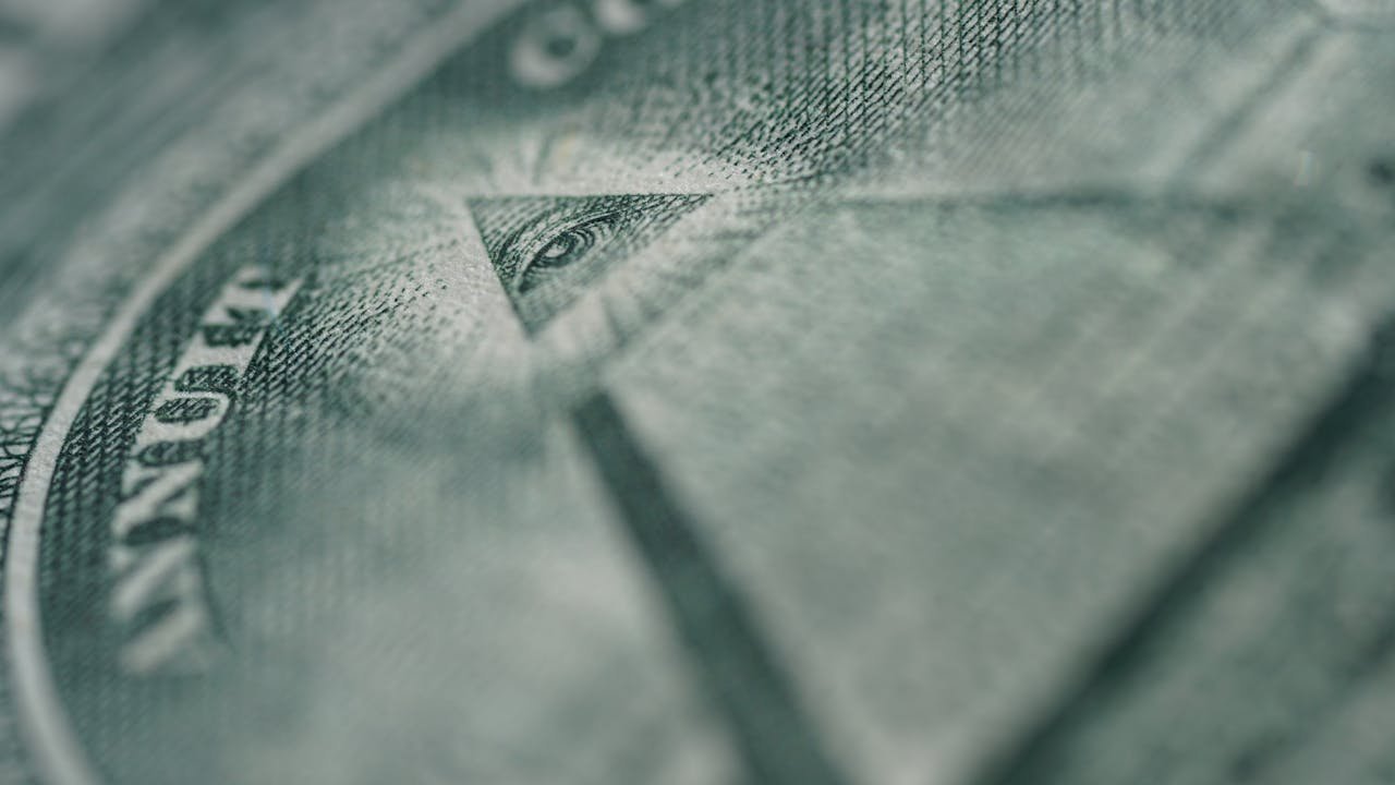 Detailed macro shot of the Eye of Providence on an American dollar bill.